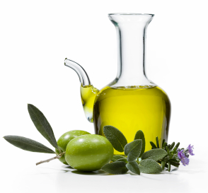 A glass oil bottle with olives and green leaves — symbolizing healthy oil alternatives like olive oil